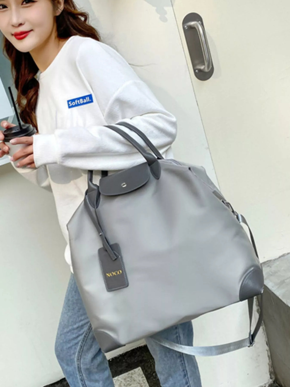 Black travel duffel bag front view