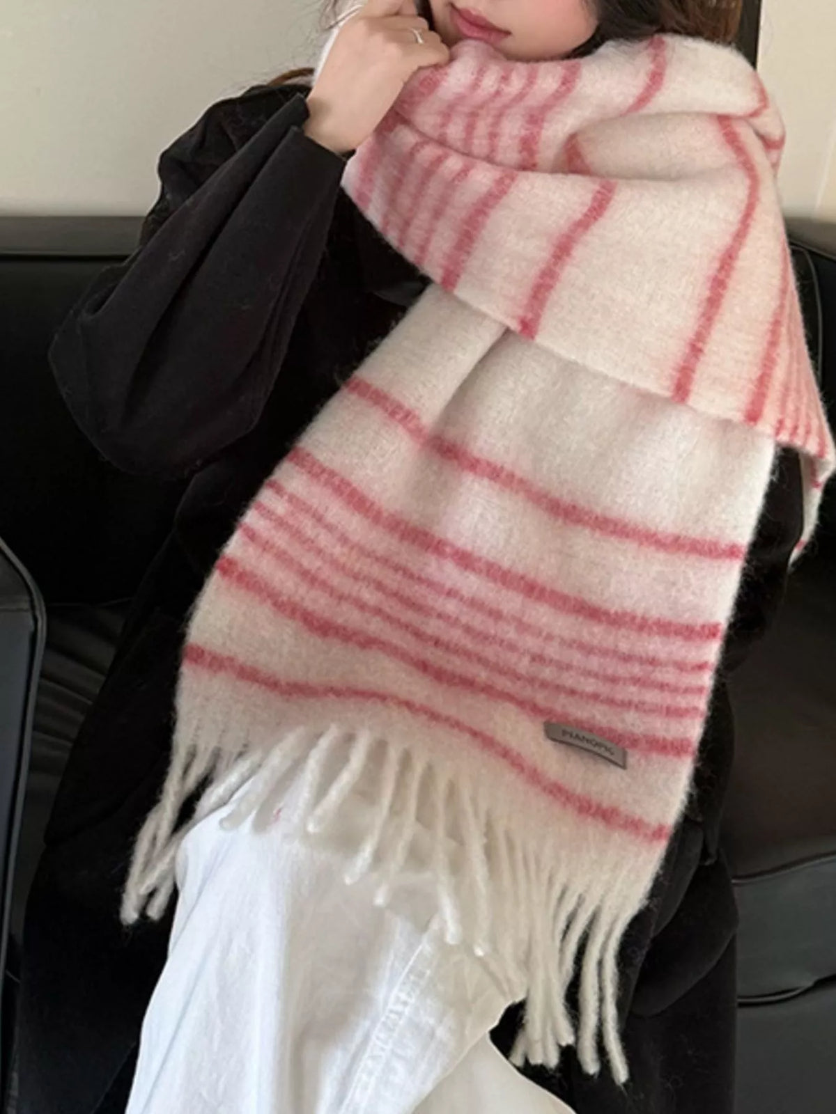 Striped fringe scarf styled with a casual coat