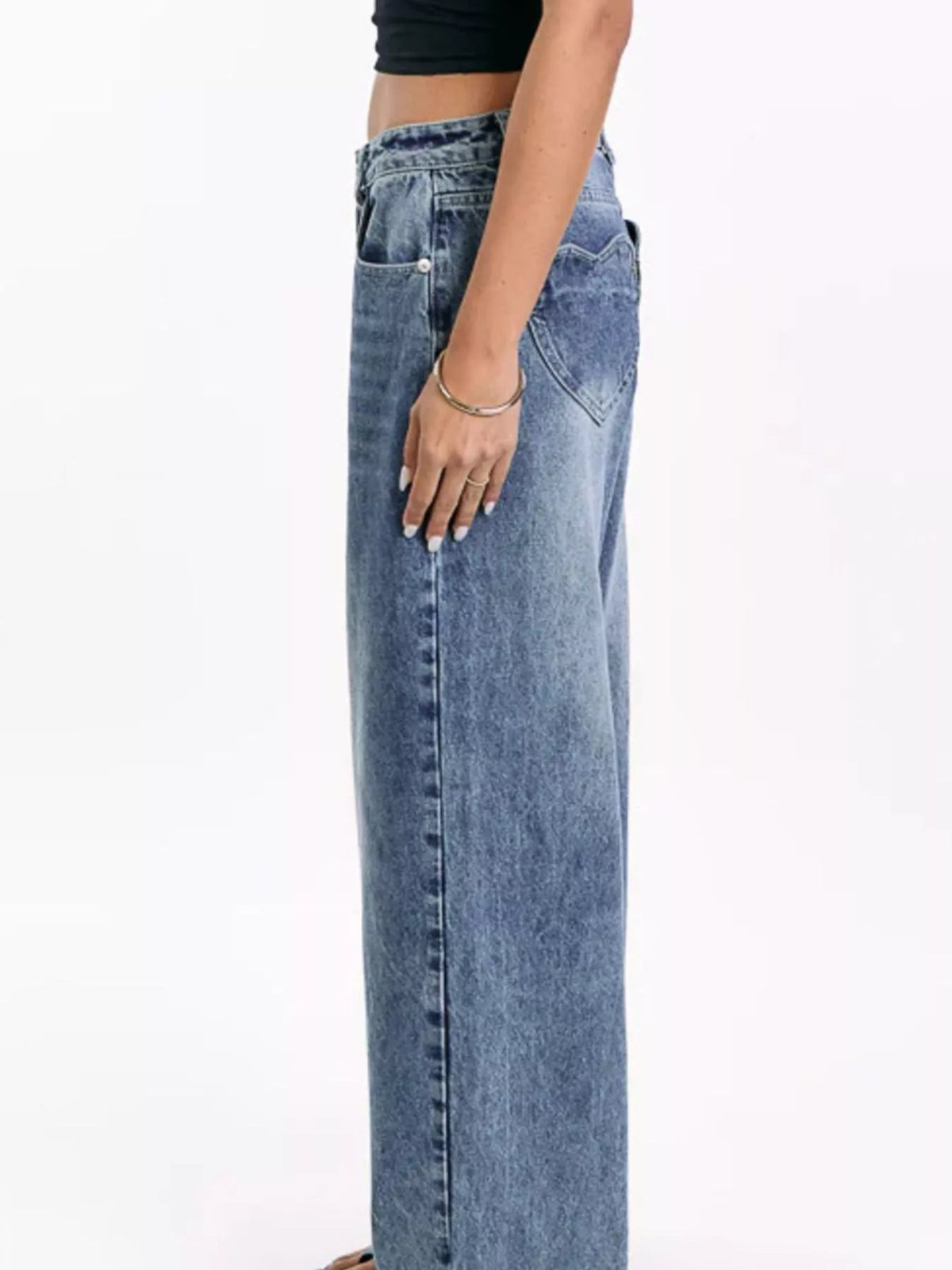 Blue wide leg jeans styled full length view
