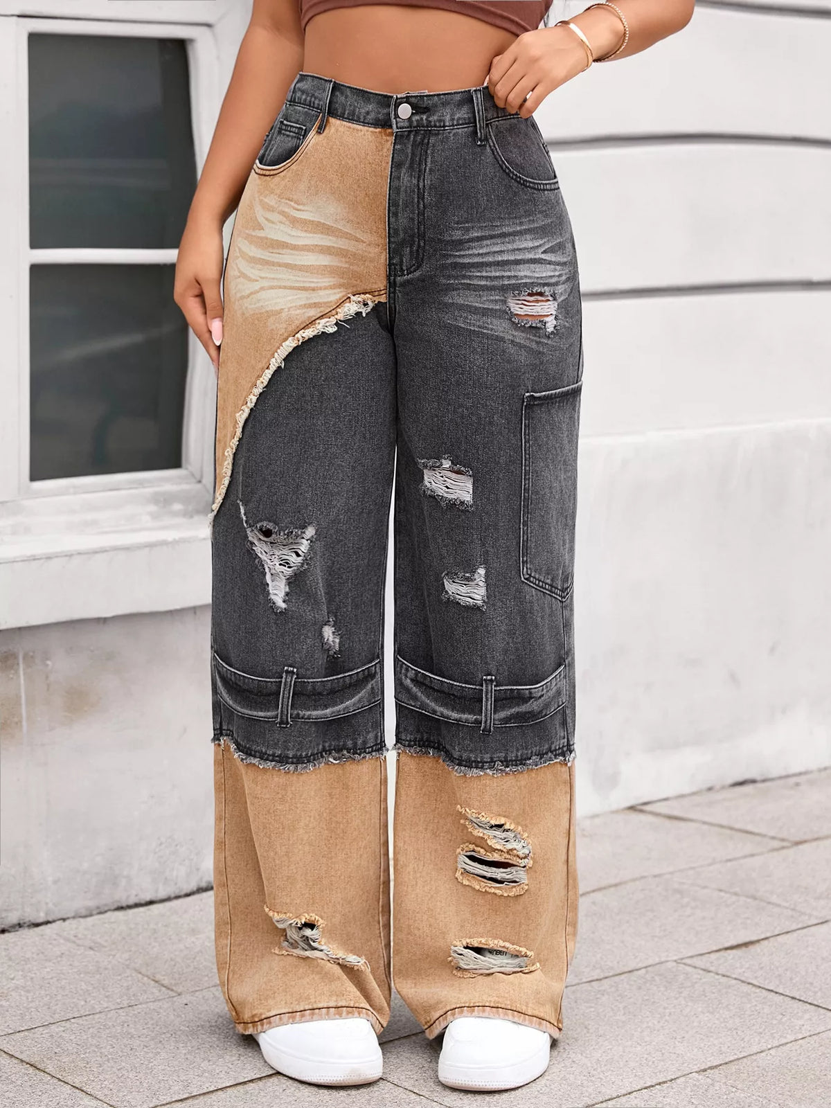 Two tone ripped wide leg jeans in black front view