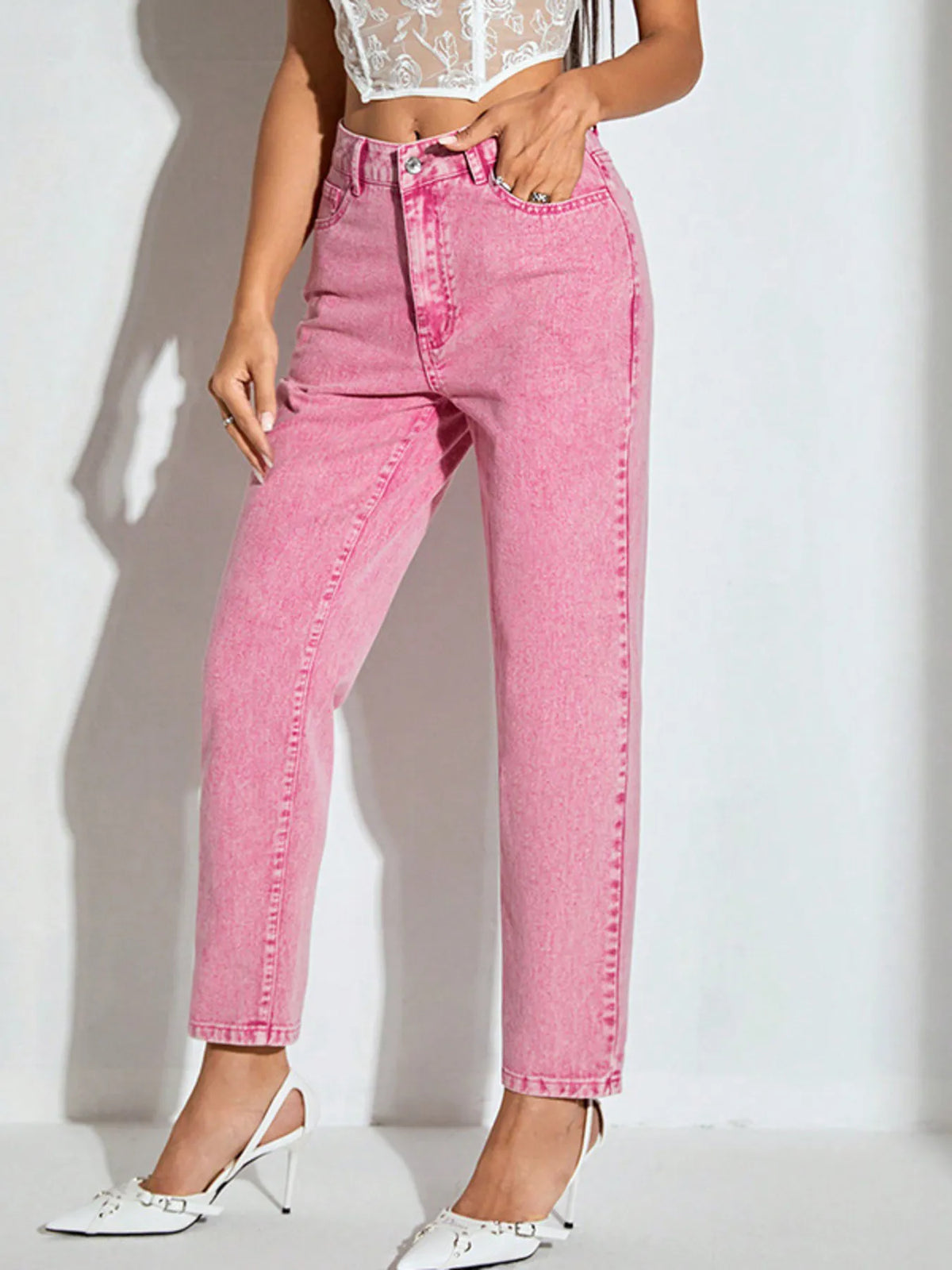 Back view of dusty pink straight leg jeans