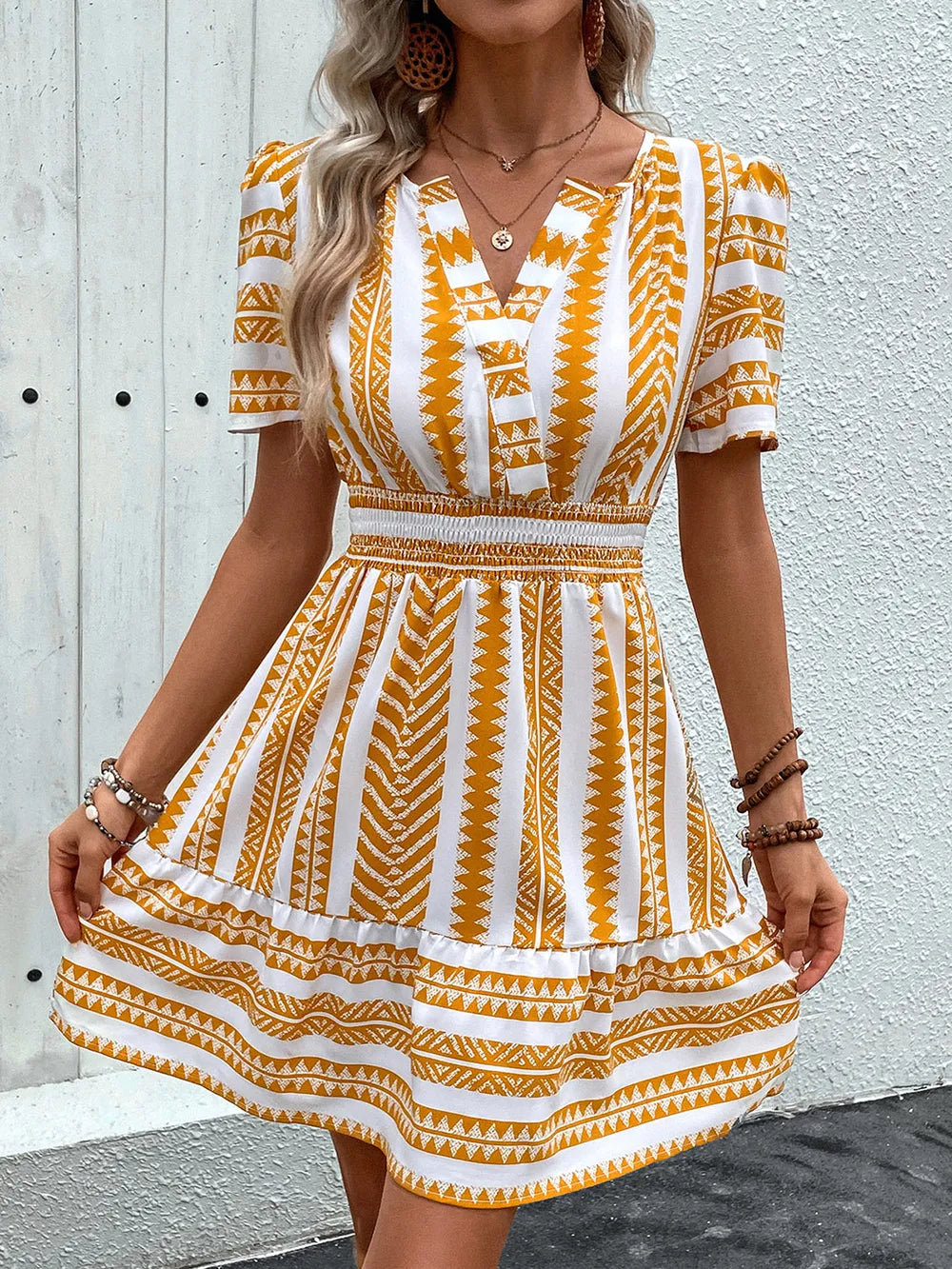 Mustard mini dress fabric detail