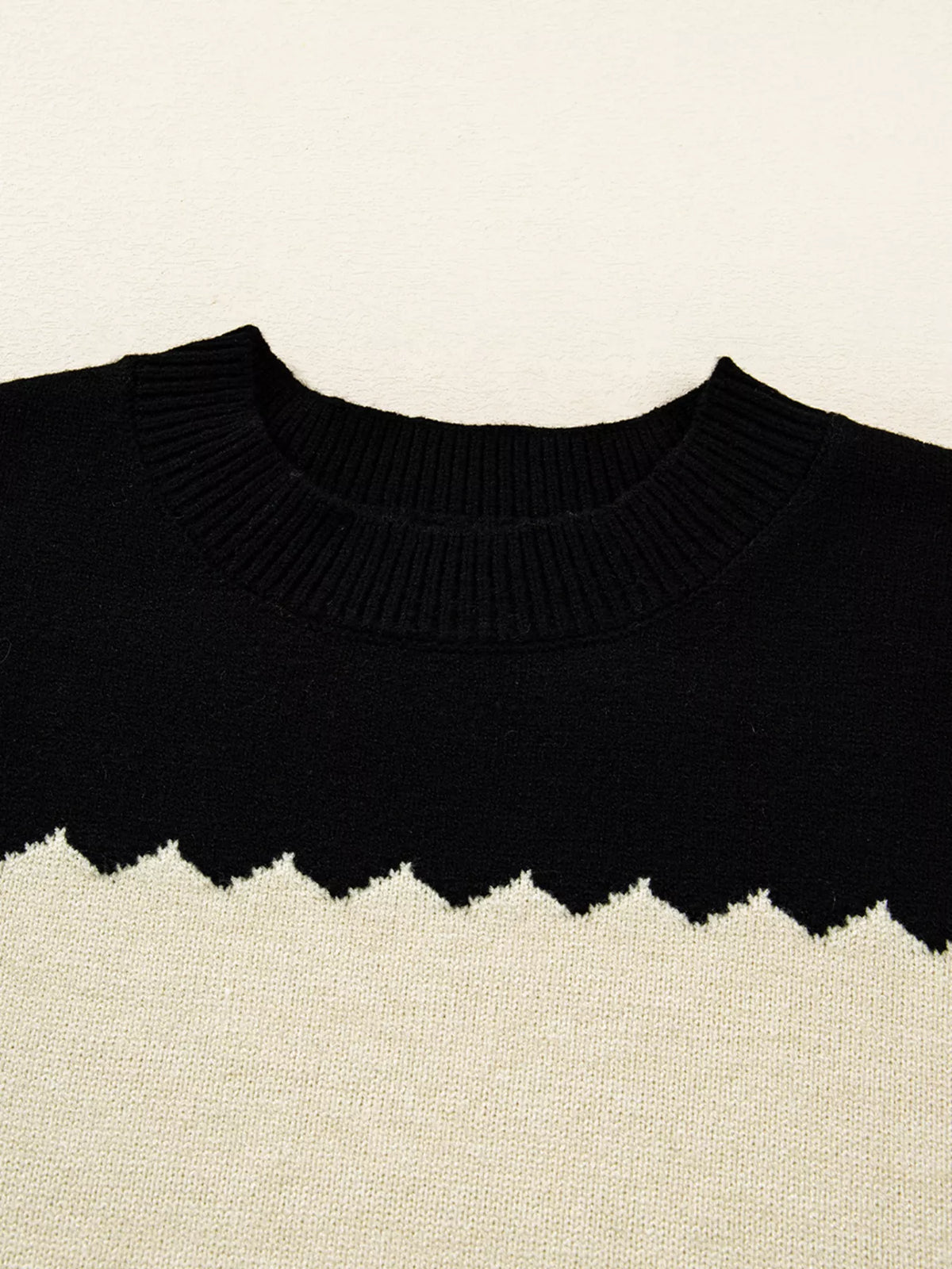 Color block crew neck drop shoulder sweater in black fabric detail
