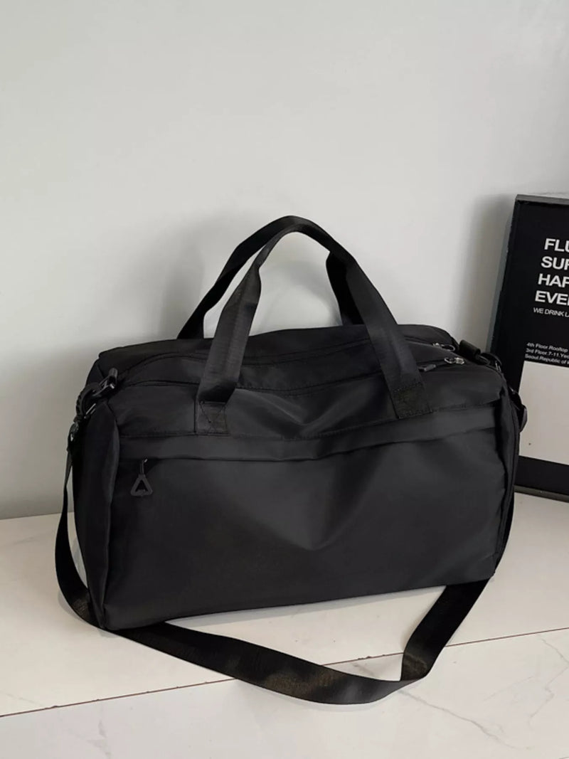 Large capacity nylon travel duffel bag in black front view
