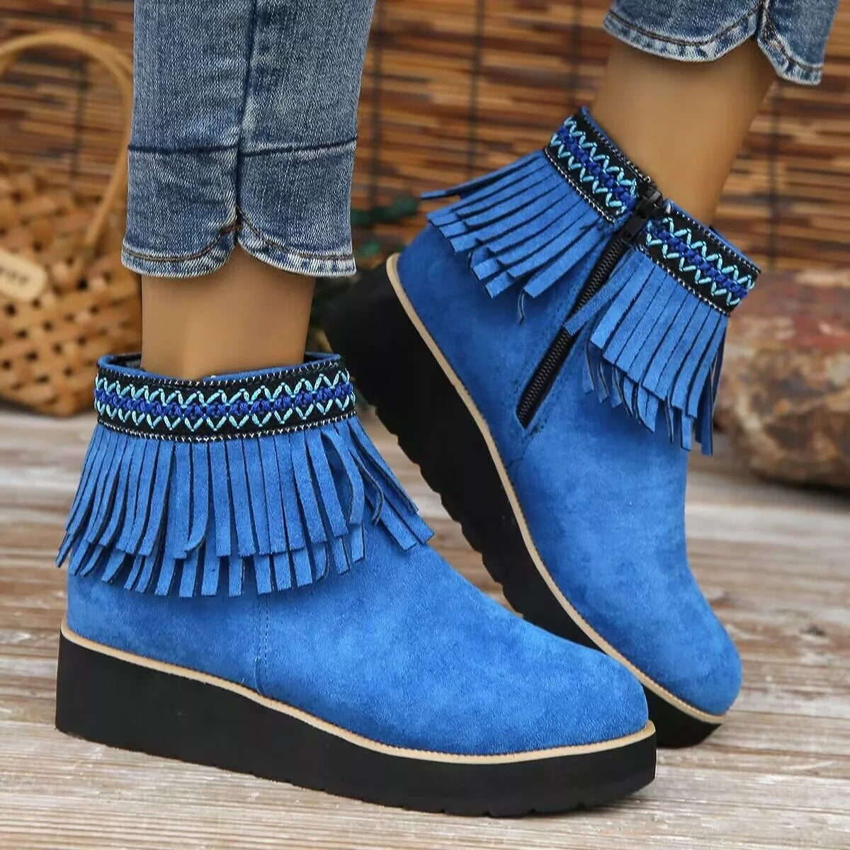 Fringe round toe ankle boots styled with jeans