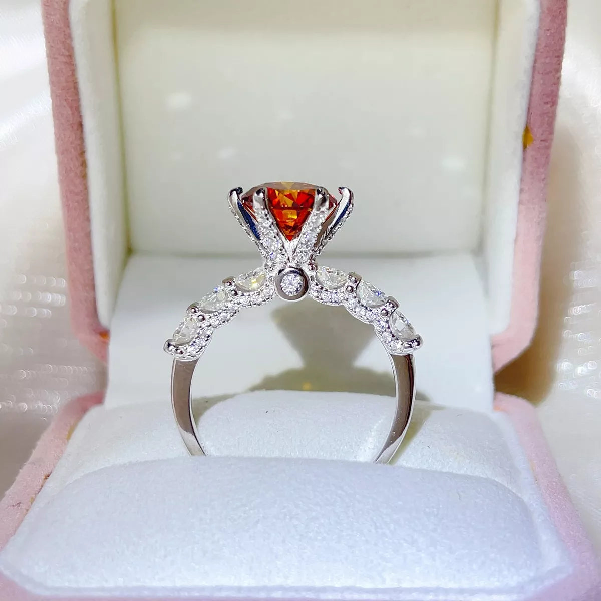 Close up of the 3 carat red moissanite centre stone