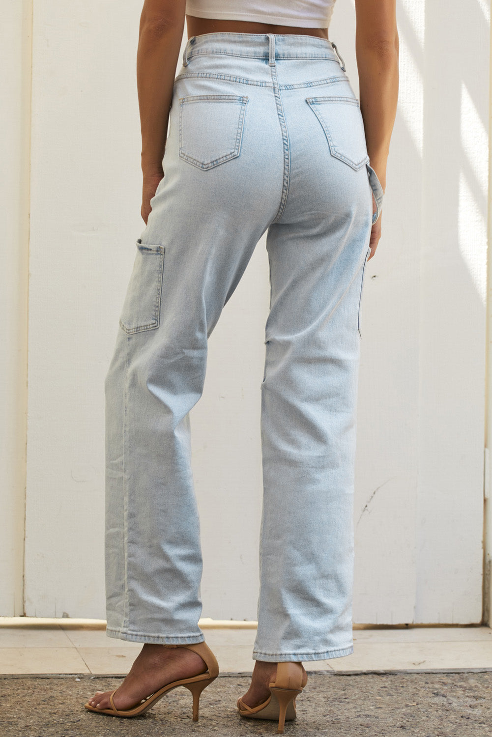 Baggy denim jeans side view showing cargo pockets