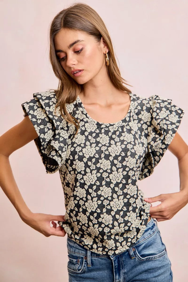 Black floral ruffle sleeve top styled with denim