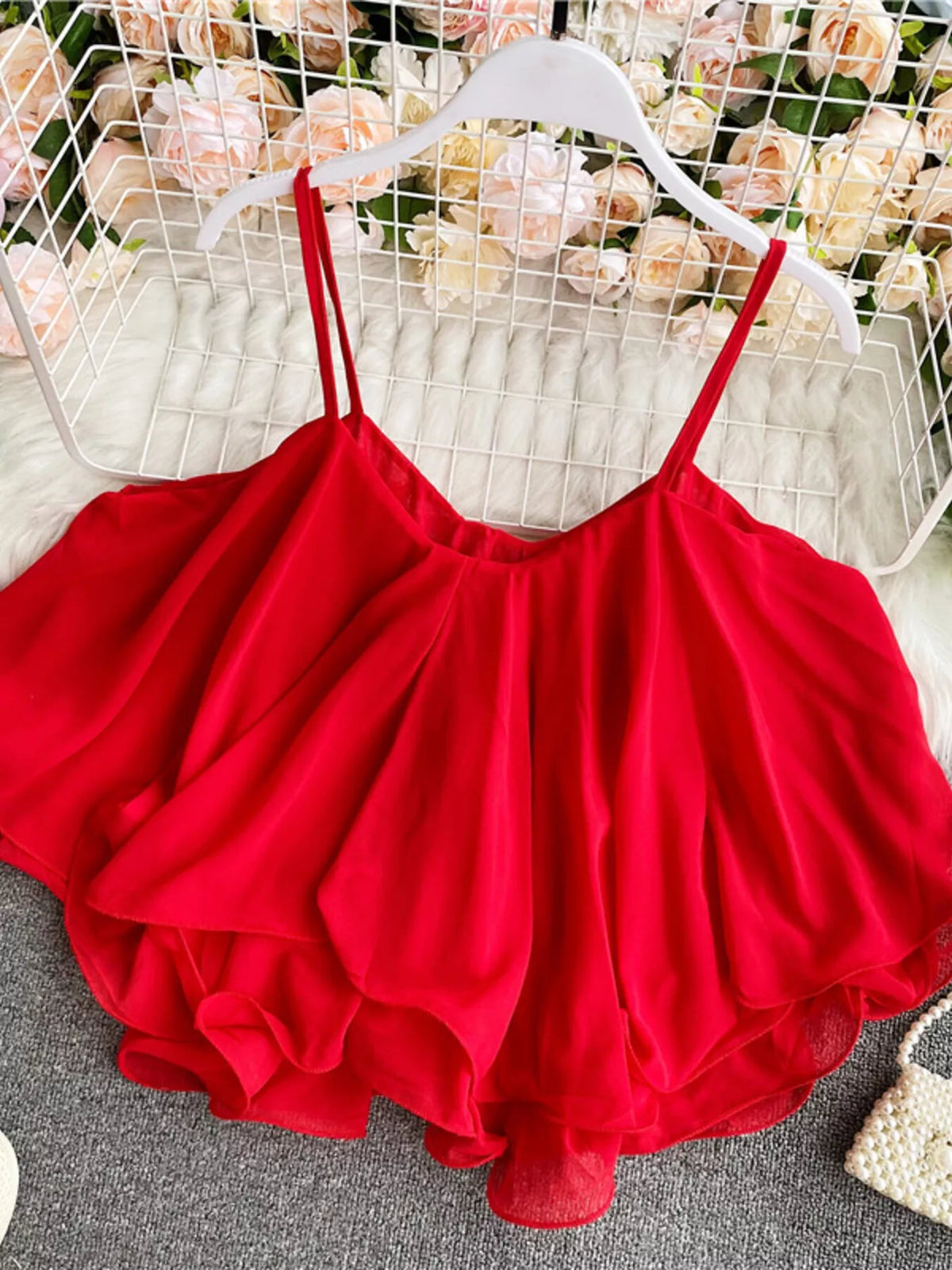 Ruffled flowy cami top close up detail