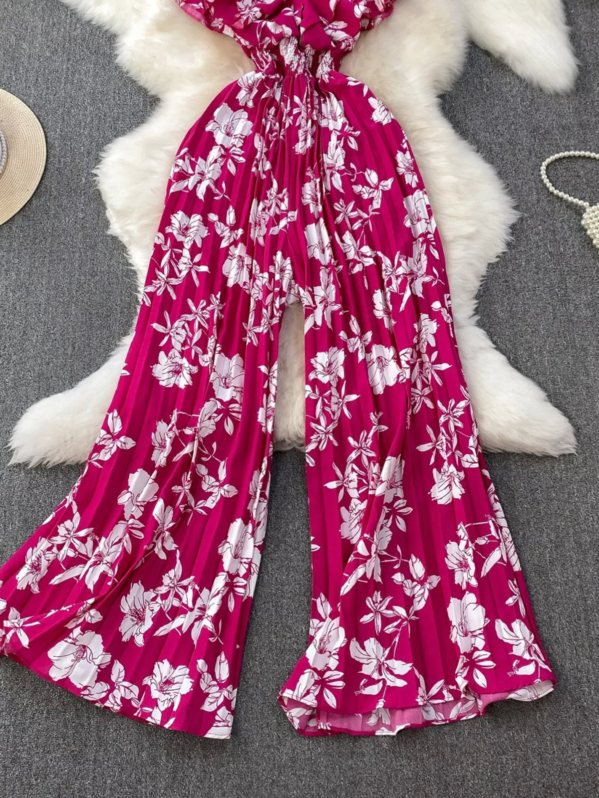 Floral print wide leg pleated jumpsuit detail view