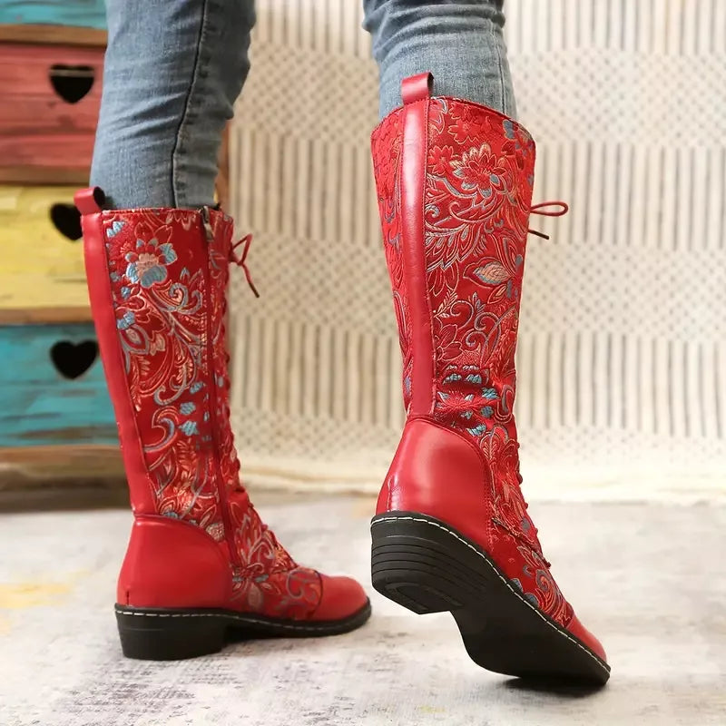 Embroidered knee high boots back of the shaft