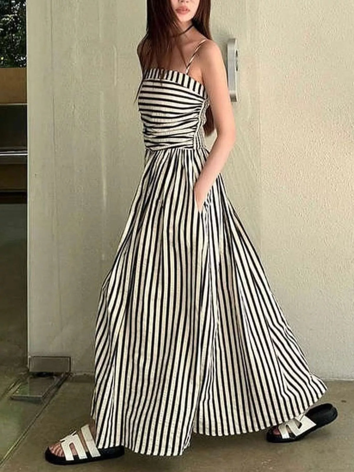 Striped spaghetti strap dress movement shot