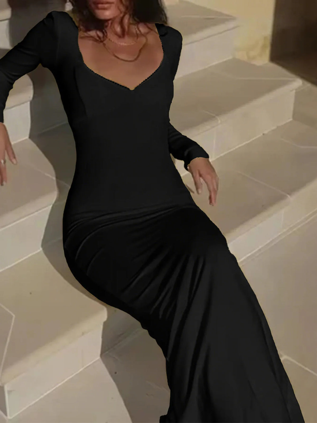 Deep V long sleeve slim maxi dress neckline detail