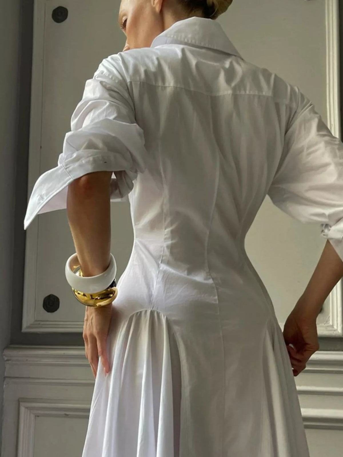 Shirt collar detail on the white maxi dress