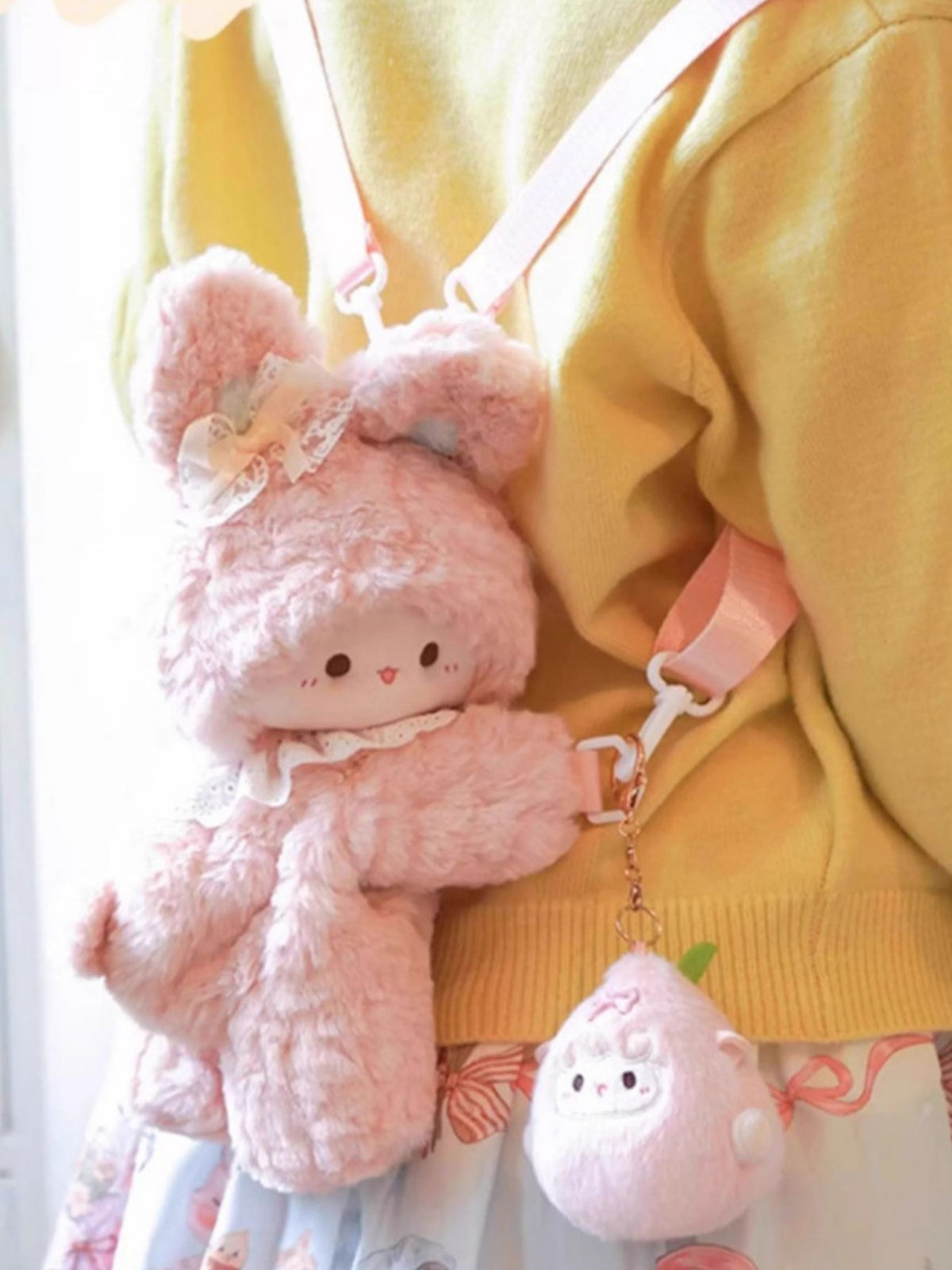 Blush pink plush bunny backpack interior compartment