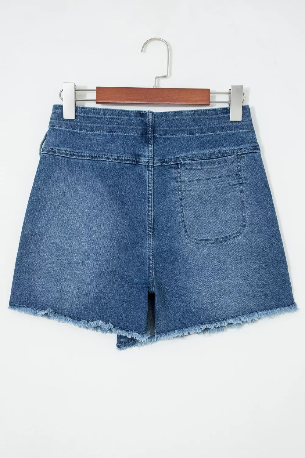 Medium wash wrapped tie waist denim skort front view