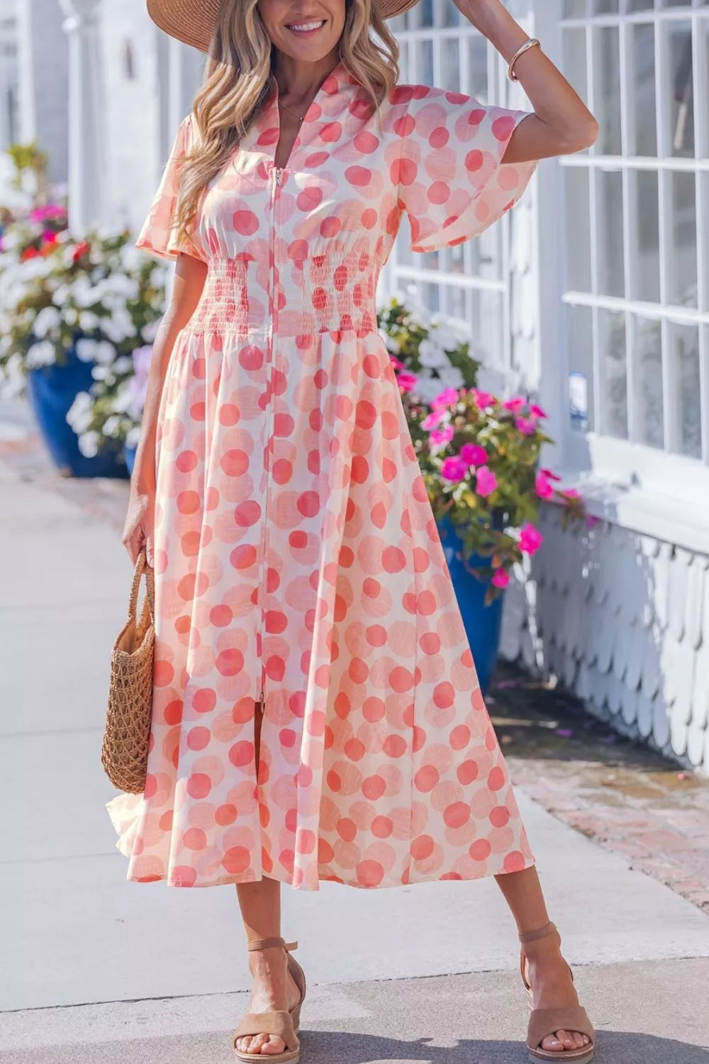 Polka dot puff sleeve midi dress, styled on model