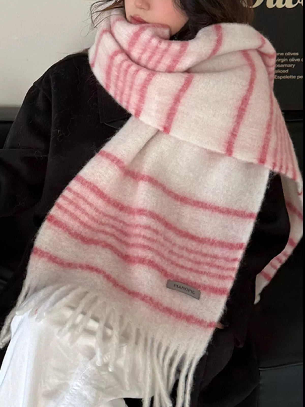 Close view of the stripe pattern on the fringe scarf