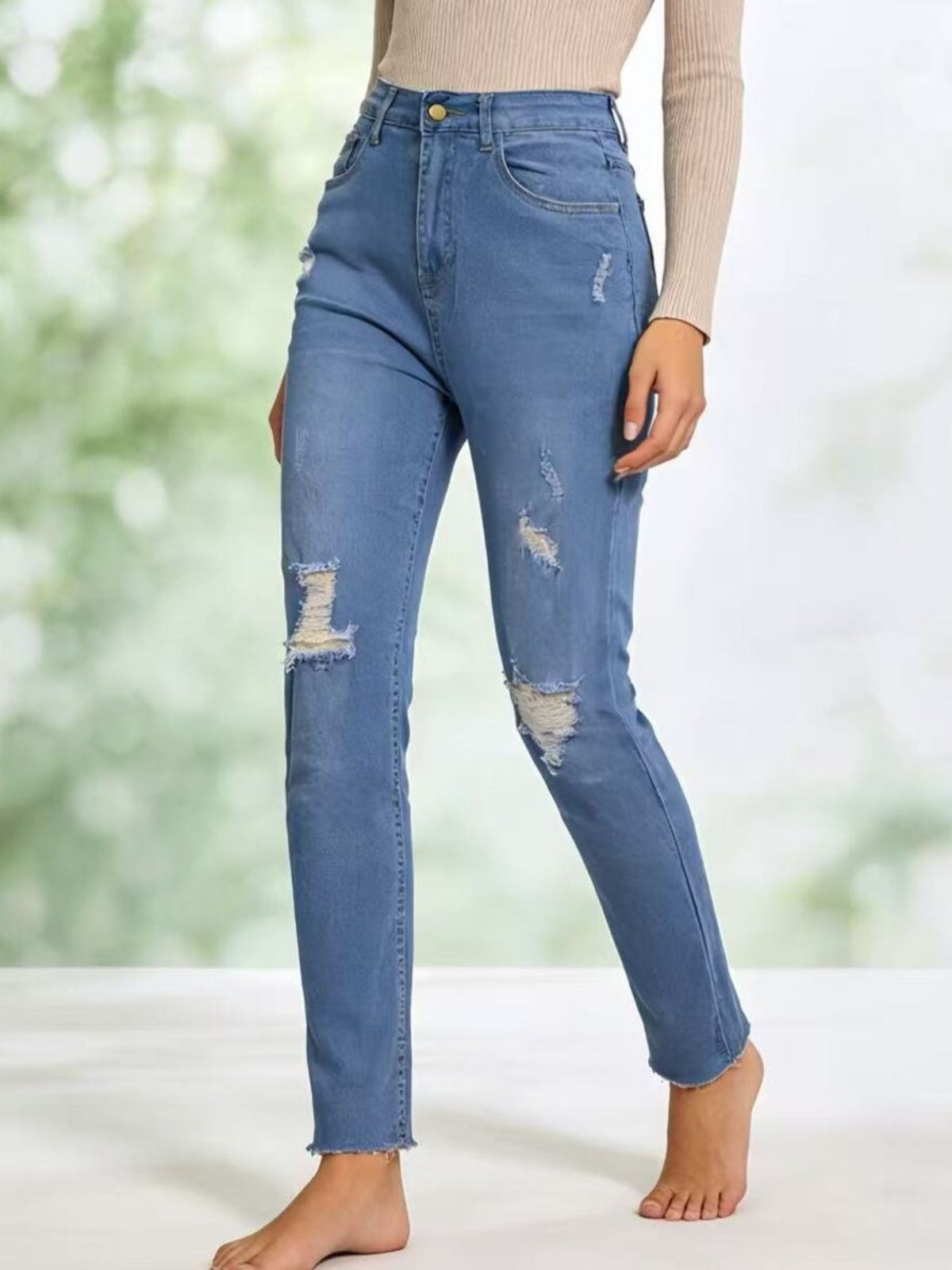 High rise distressed jeans back view