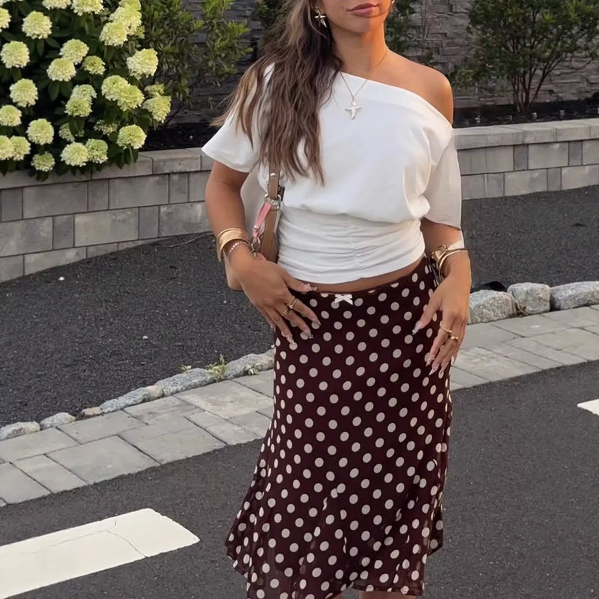 Dark brown polka dot midi skirt back view