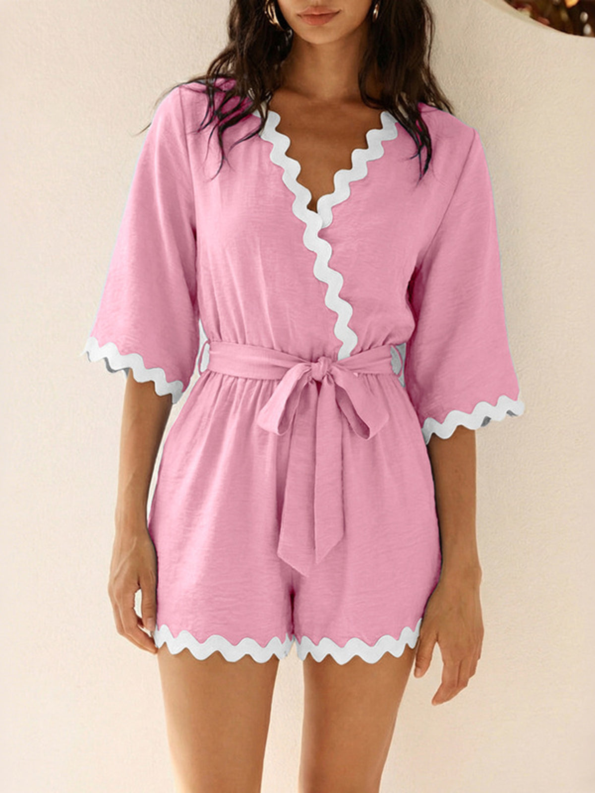 Wrap romper alternate scalloped trim close up