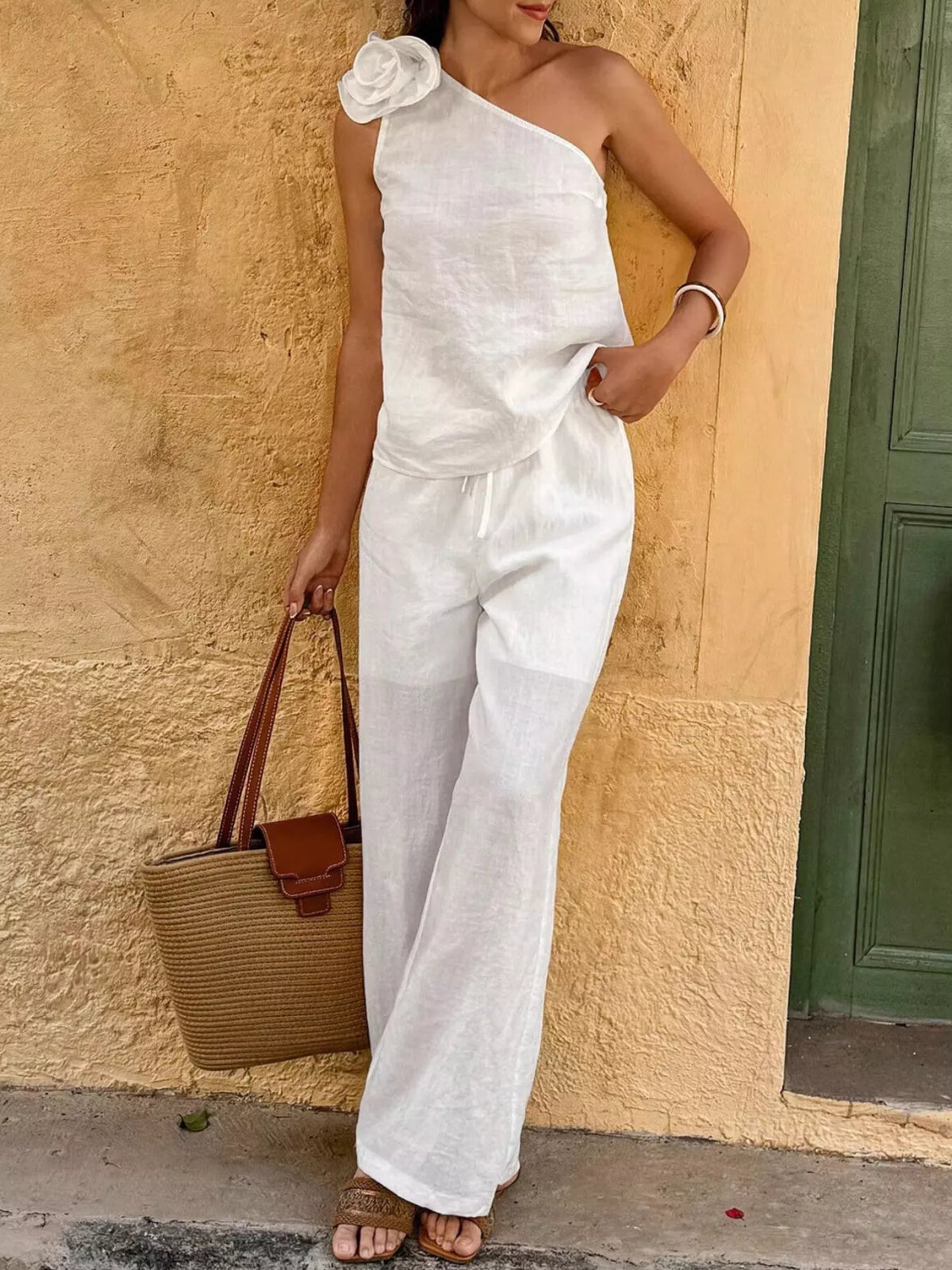 One shoulder embellished top detail