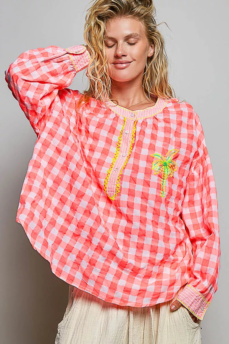 Side view of the pink gingham summer blouse