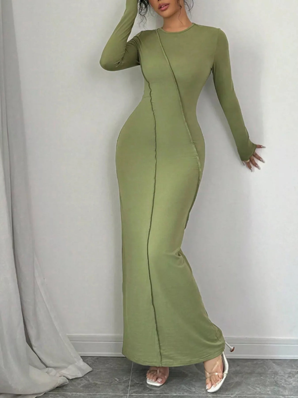 Green exposed seam long sleeve maxi dress back view