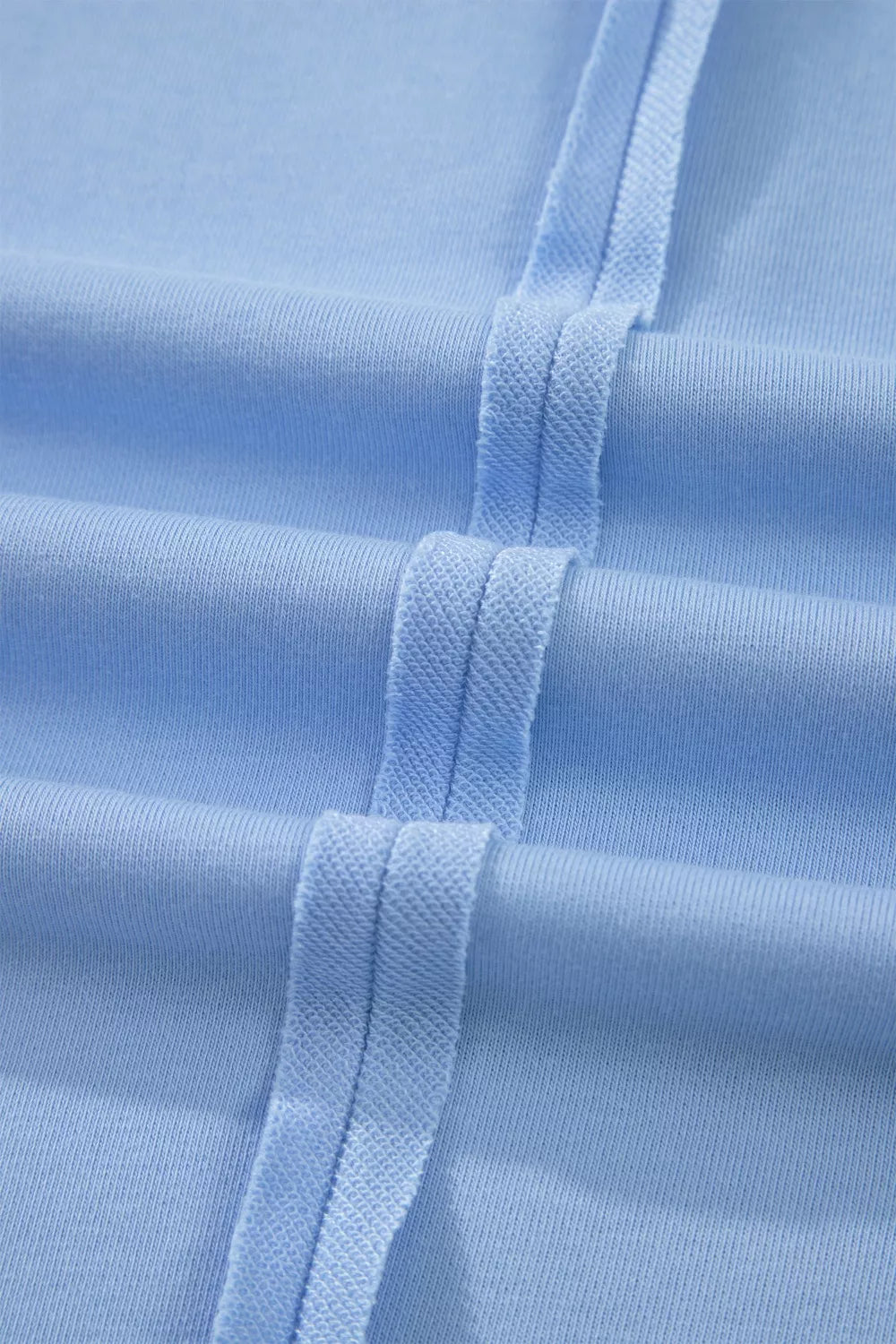 Light blue polo collar top and shorts set detail