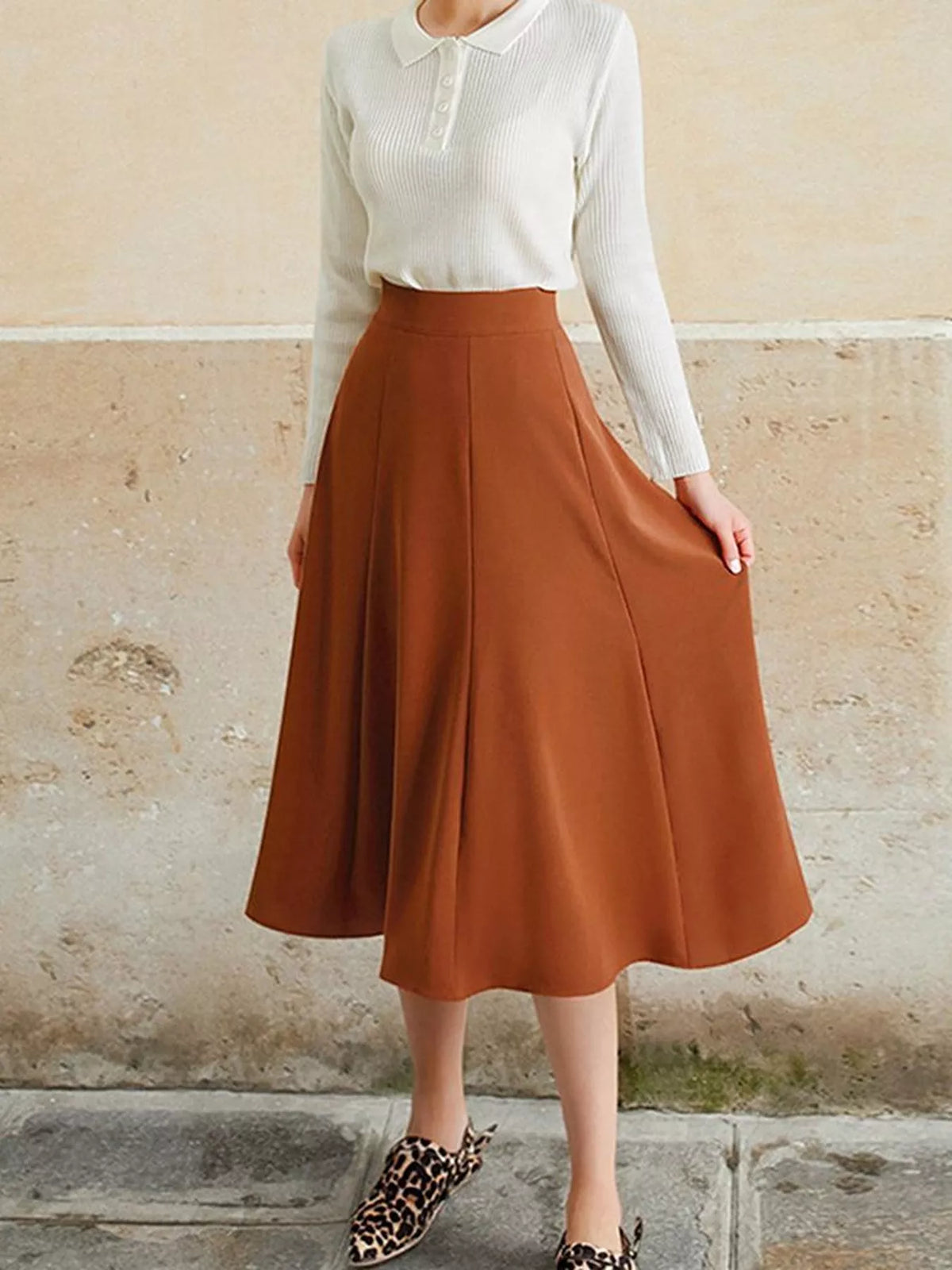 Front view of the pleated midi skirt