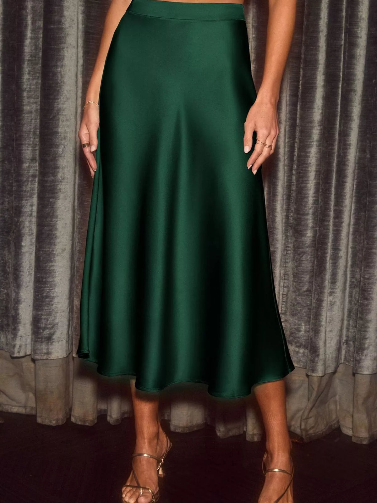 Dark green satin midi skirt side view