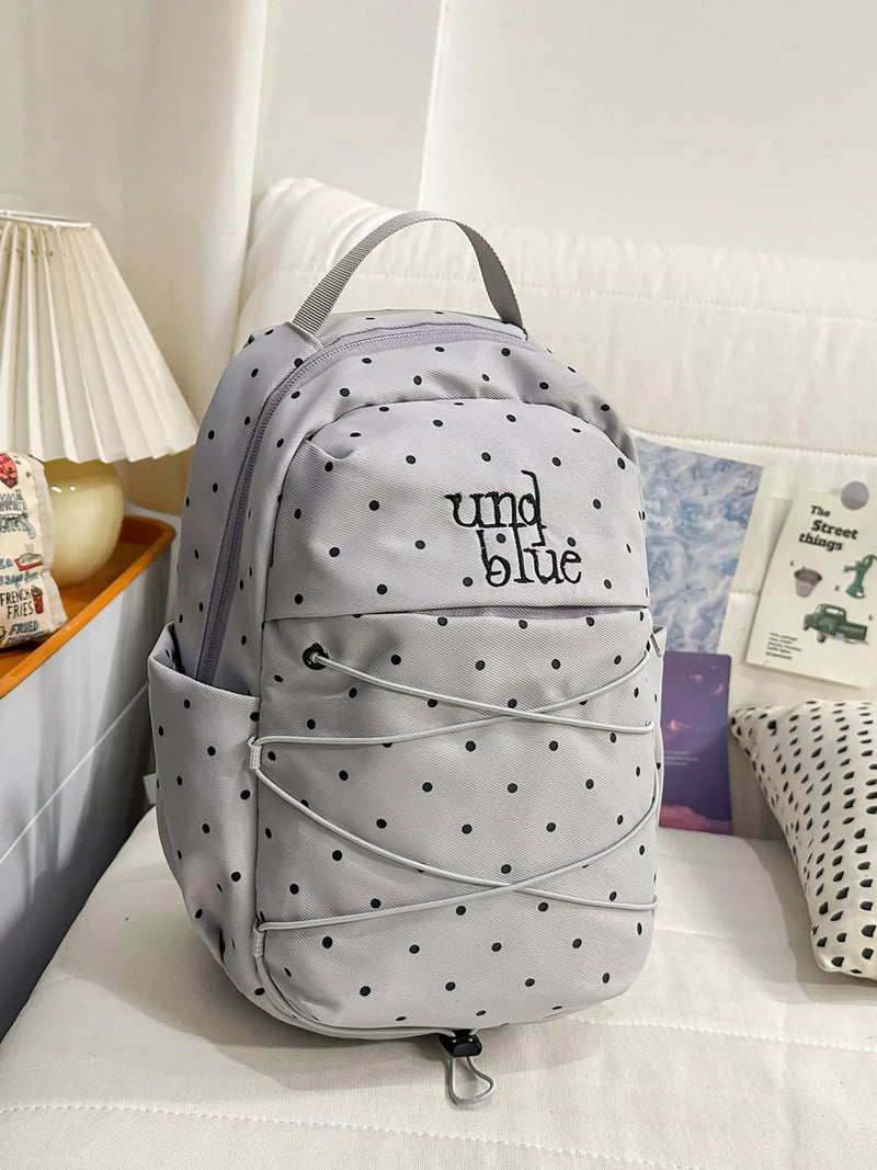 Gray polka dot polyester backpack front view