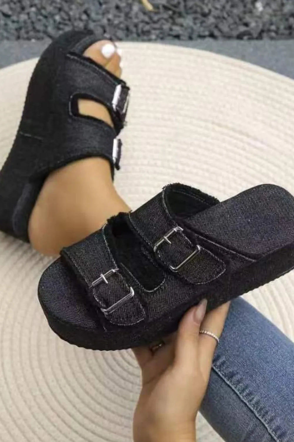 Wedge buckle sandals angled heel detail