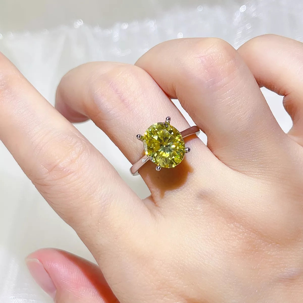 Starglow 5 carat light yellow moissanite ring in sterling silver, front view