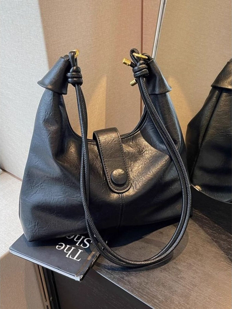 Black vintage buckle shoulder bag front view