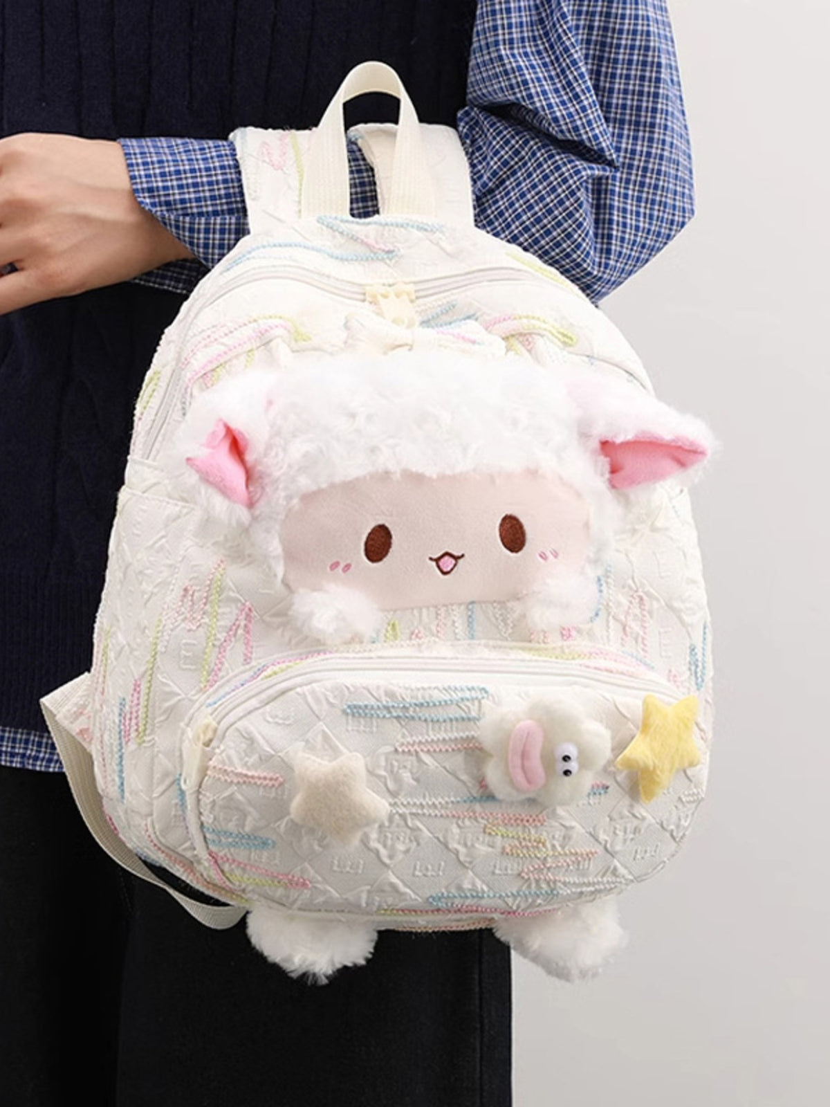 White plush sheep backpack side profile