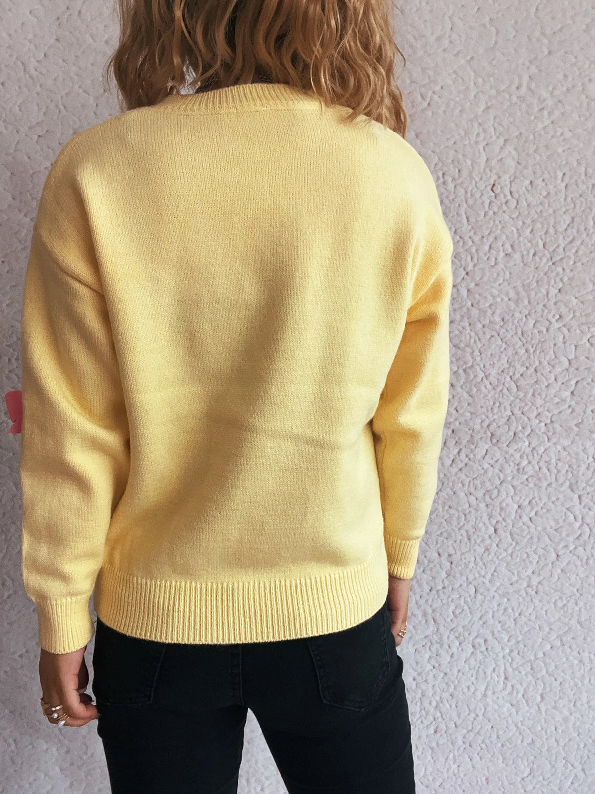 Bow round neck long sleeve sweater side view