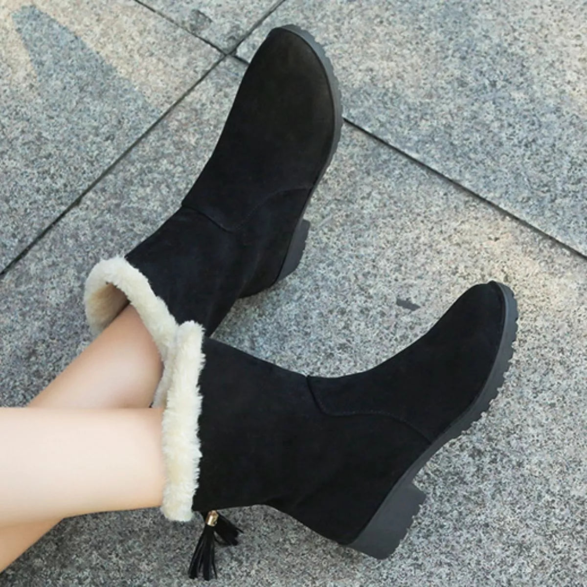 Round toe plush lined suede boots angled view