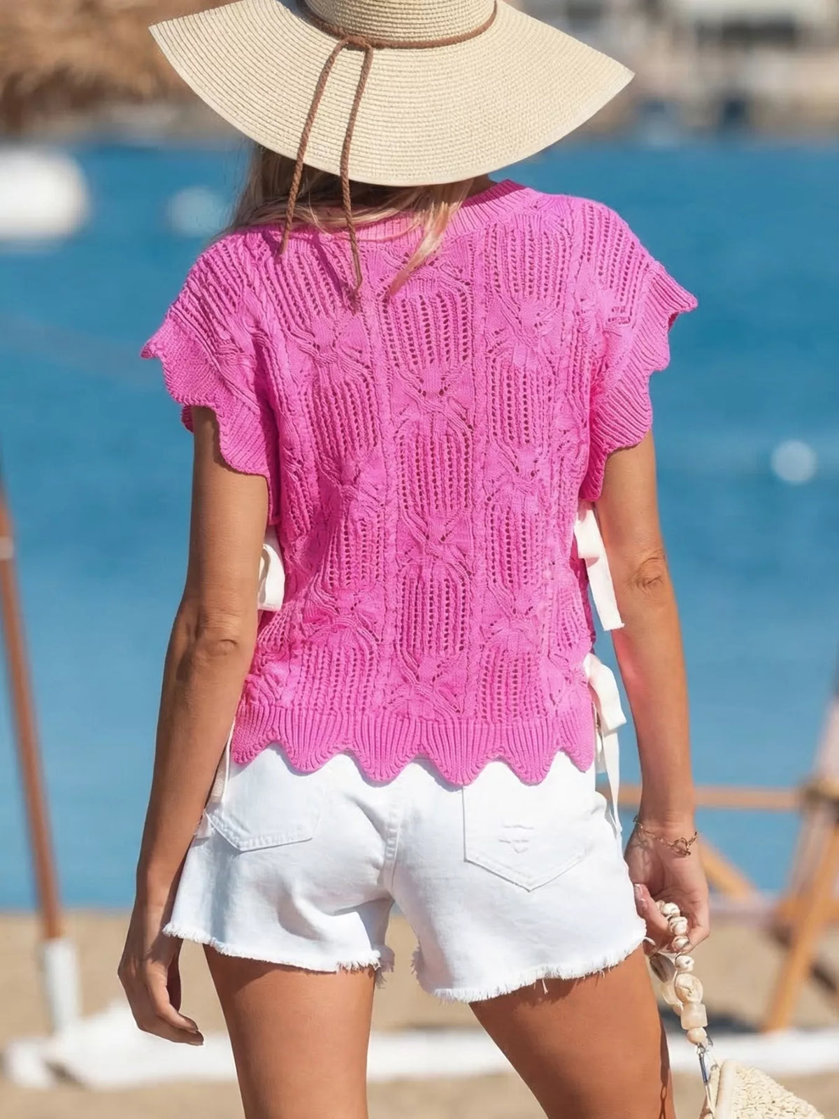 Openwork round neck knit vest side view