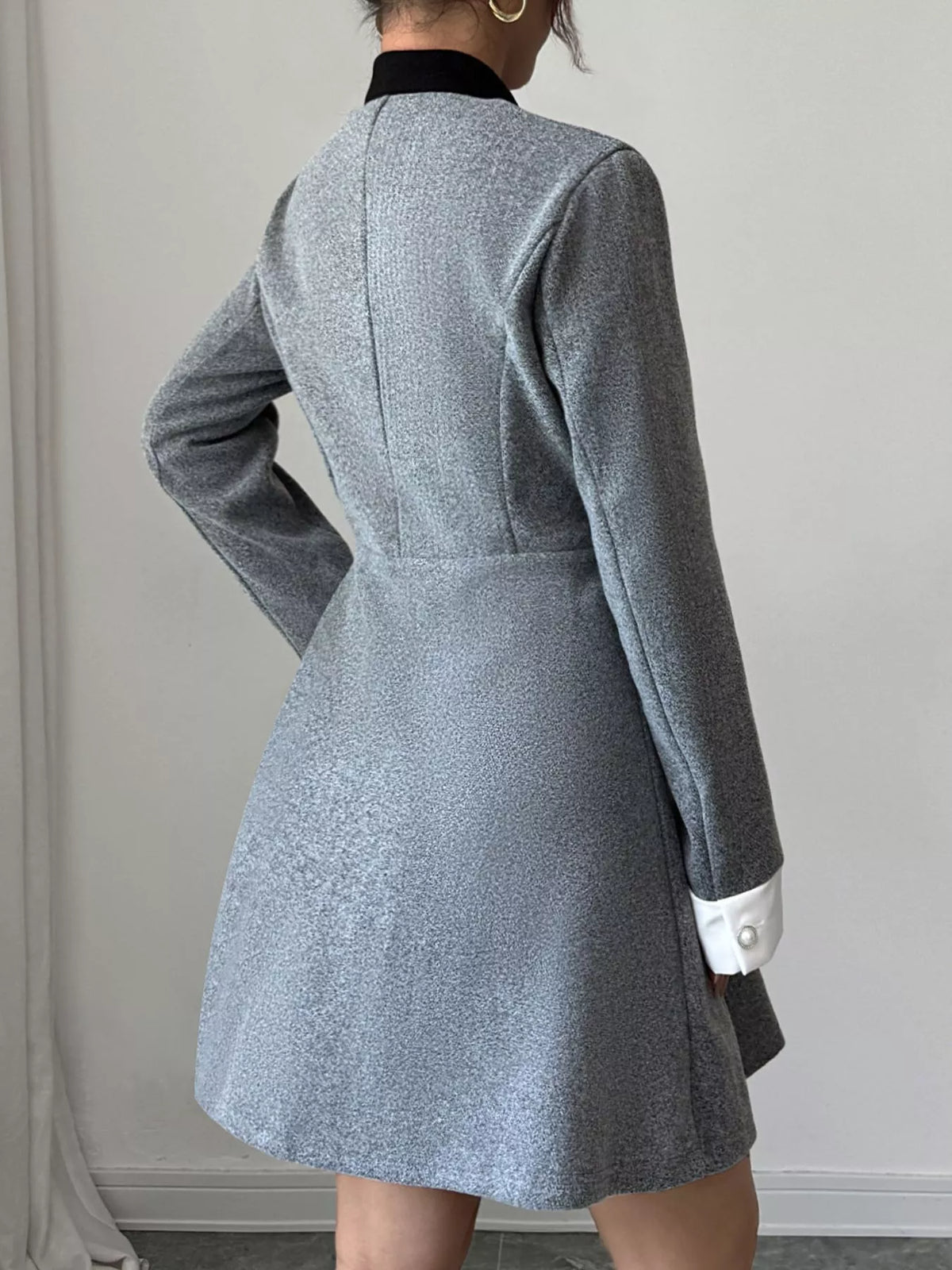 a line long sleeve button down dress in gray fabric detail