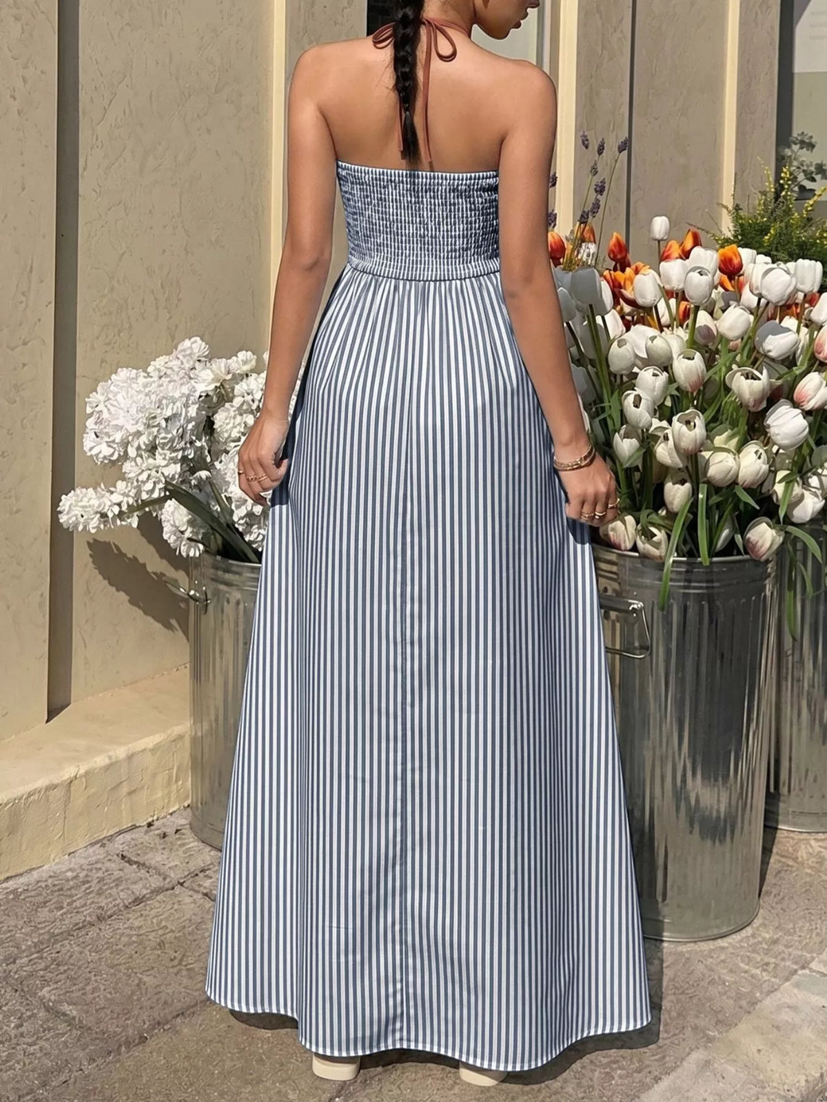 Navy blue striped halter neck maxi dress fabric detail
