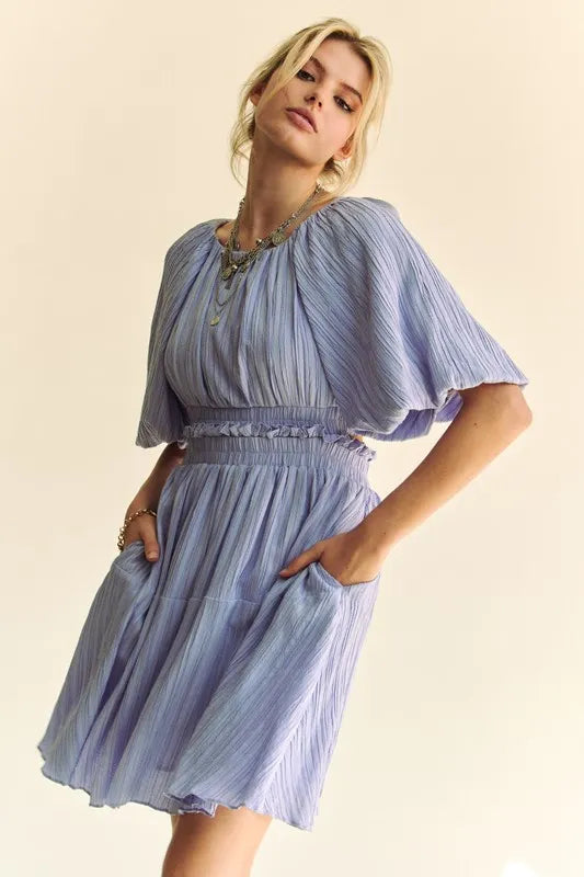 Back Button Puff Sleeve Mini Dress in Lavender side view