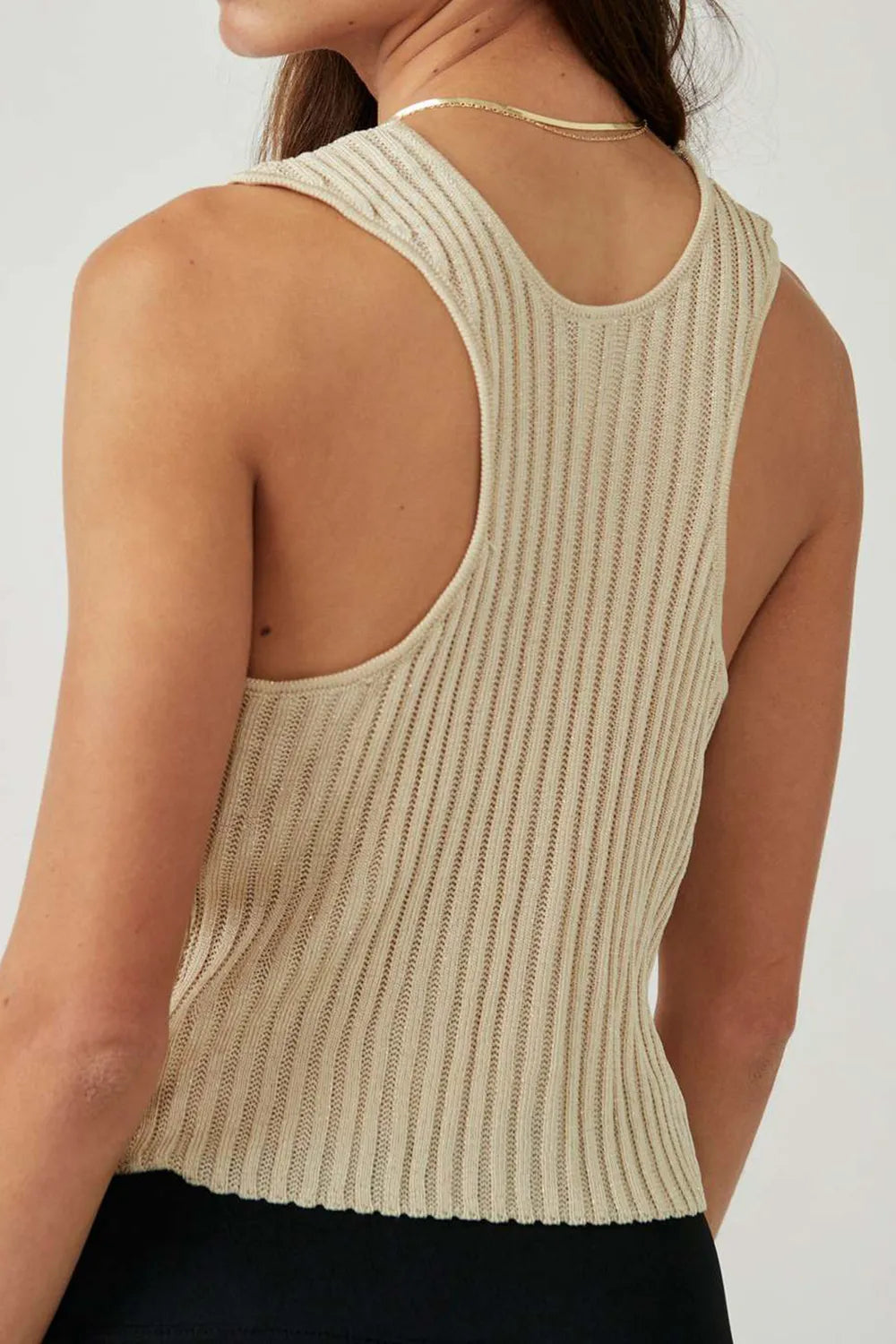 Back view of beige sweater vest