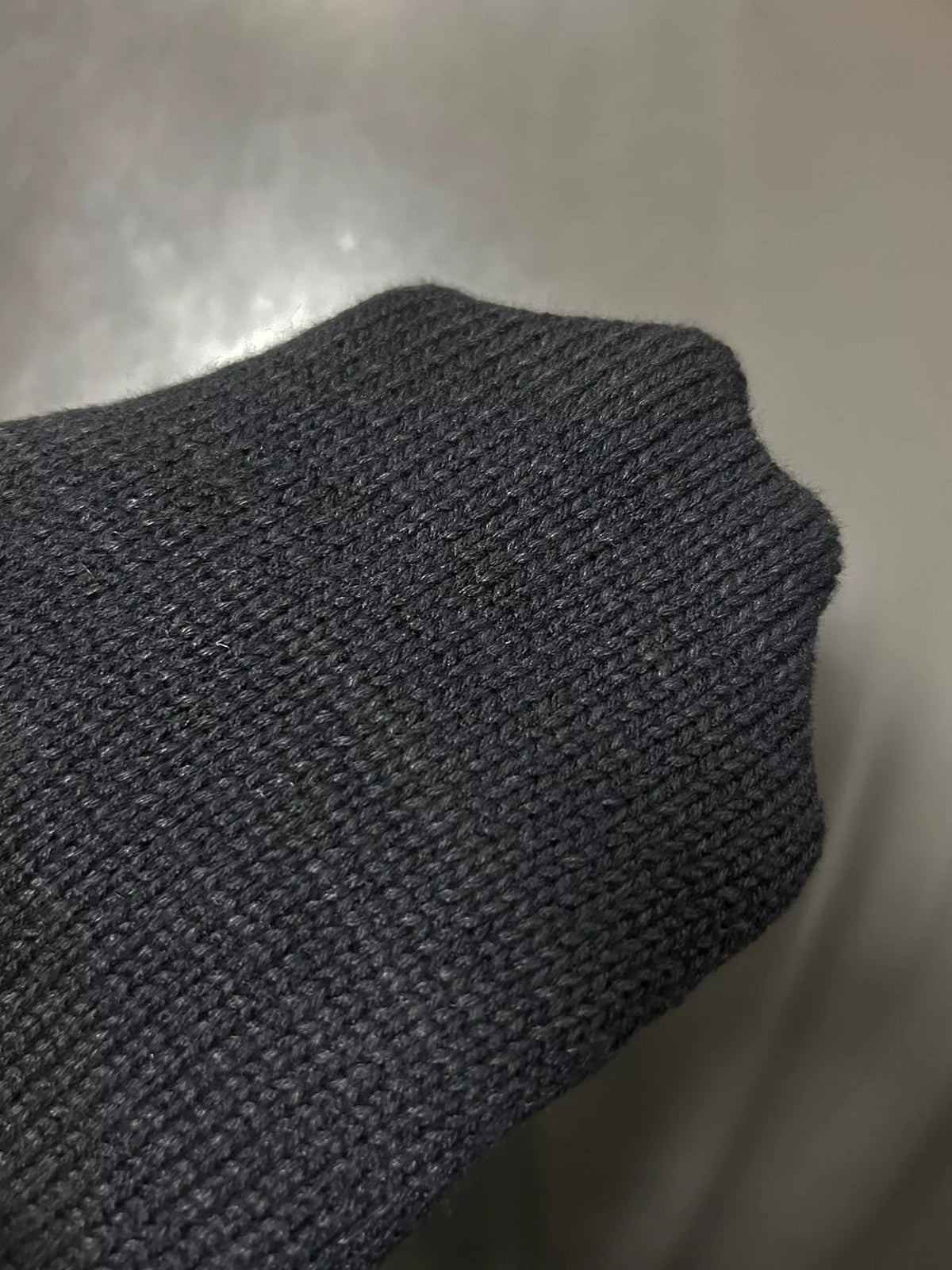 Black single shoulder top detail