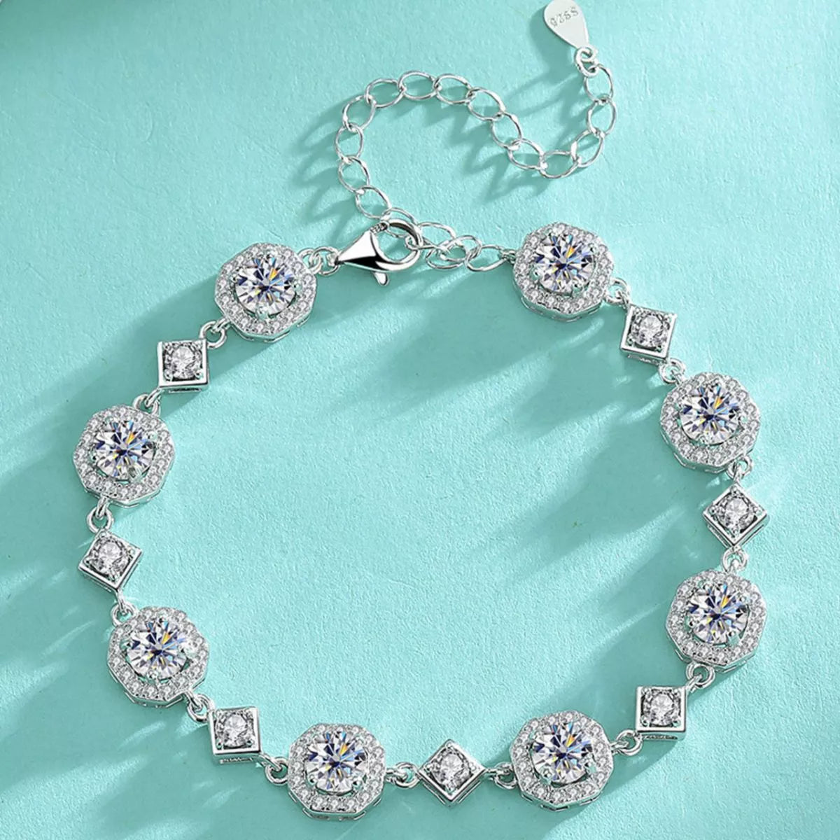 Close up of moissanite stones and silver setting