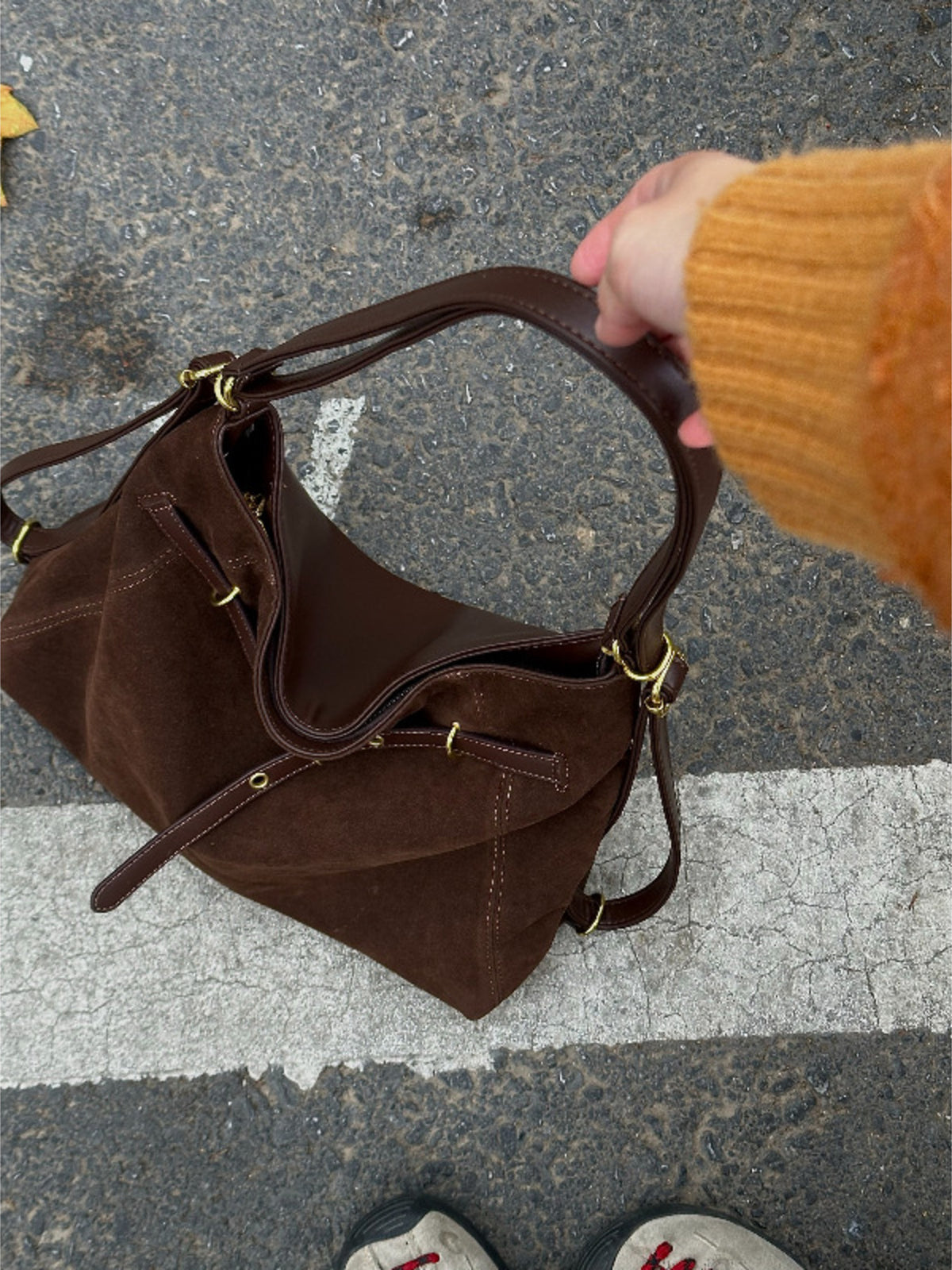 Back view of brown nylon shoulder bag