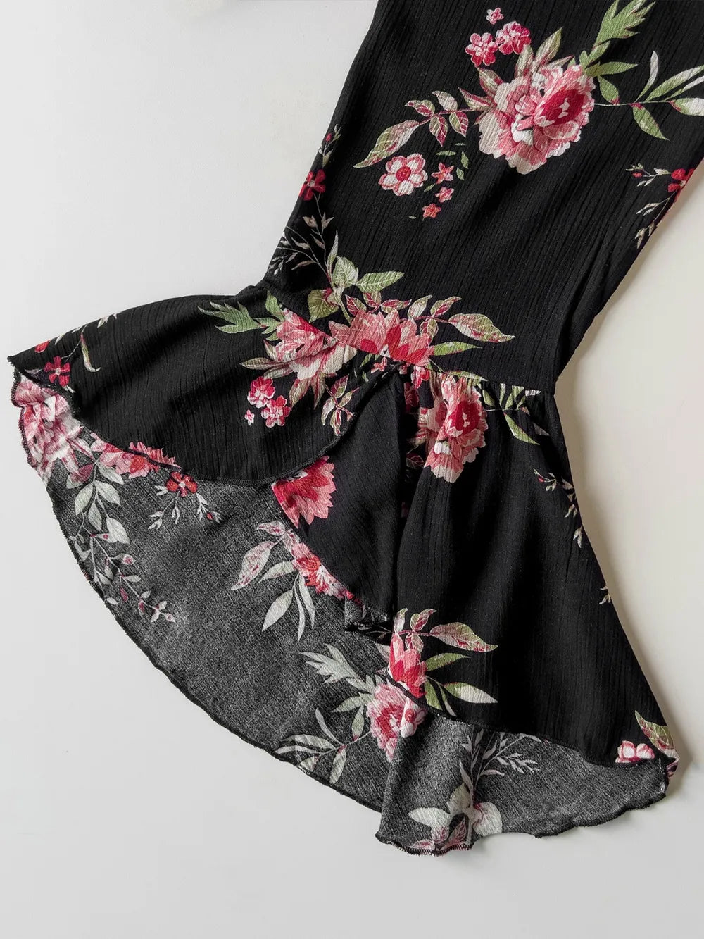 Plus size floral flare sleeve maxi dress in black close up