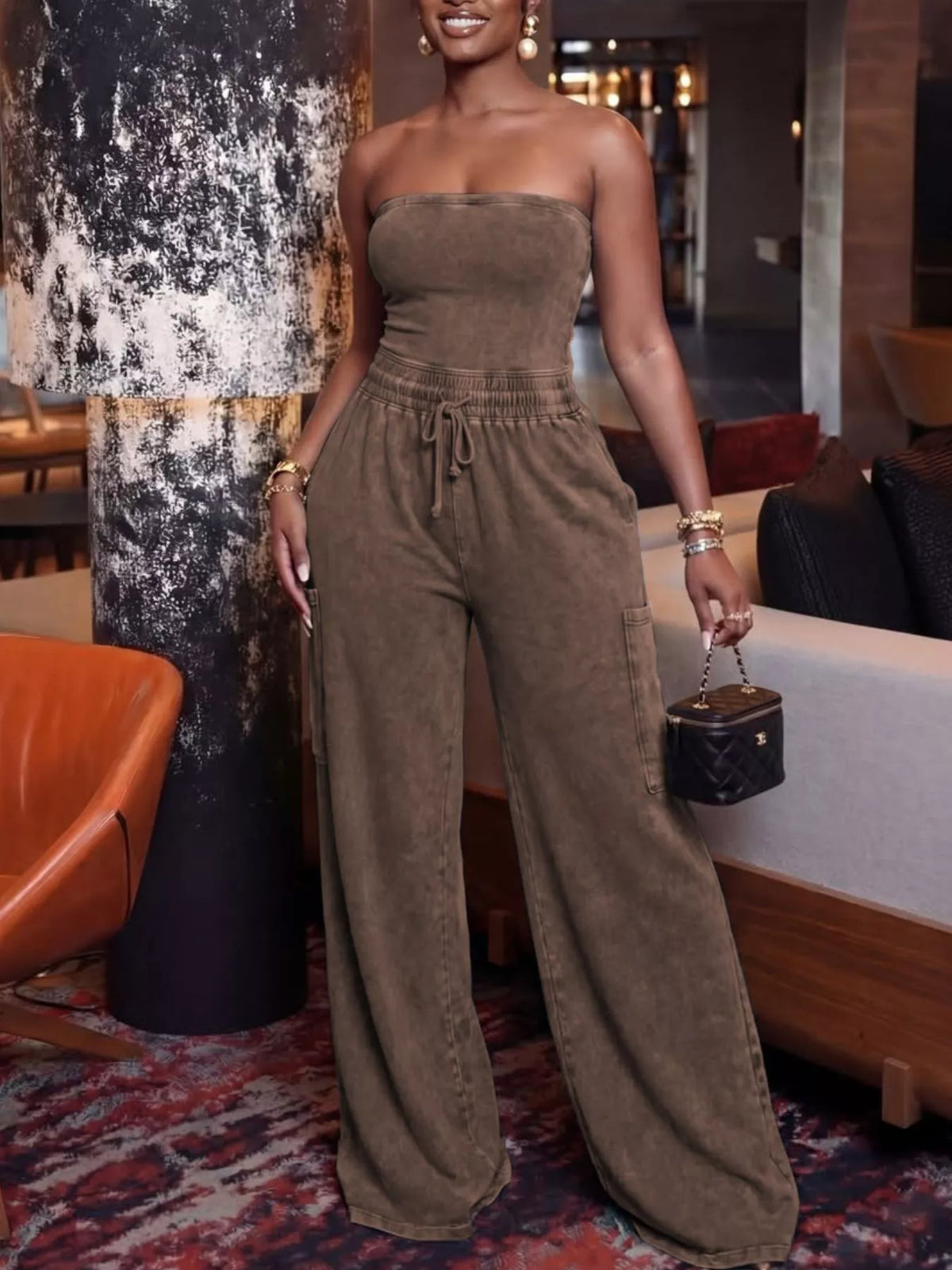 Rose red jumpsuit wide leg hem detail