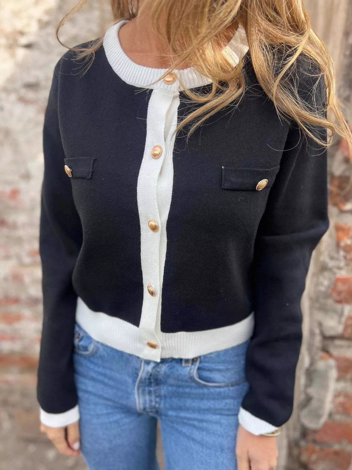 black contrast trim button up cardigan side view