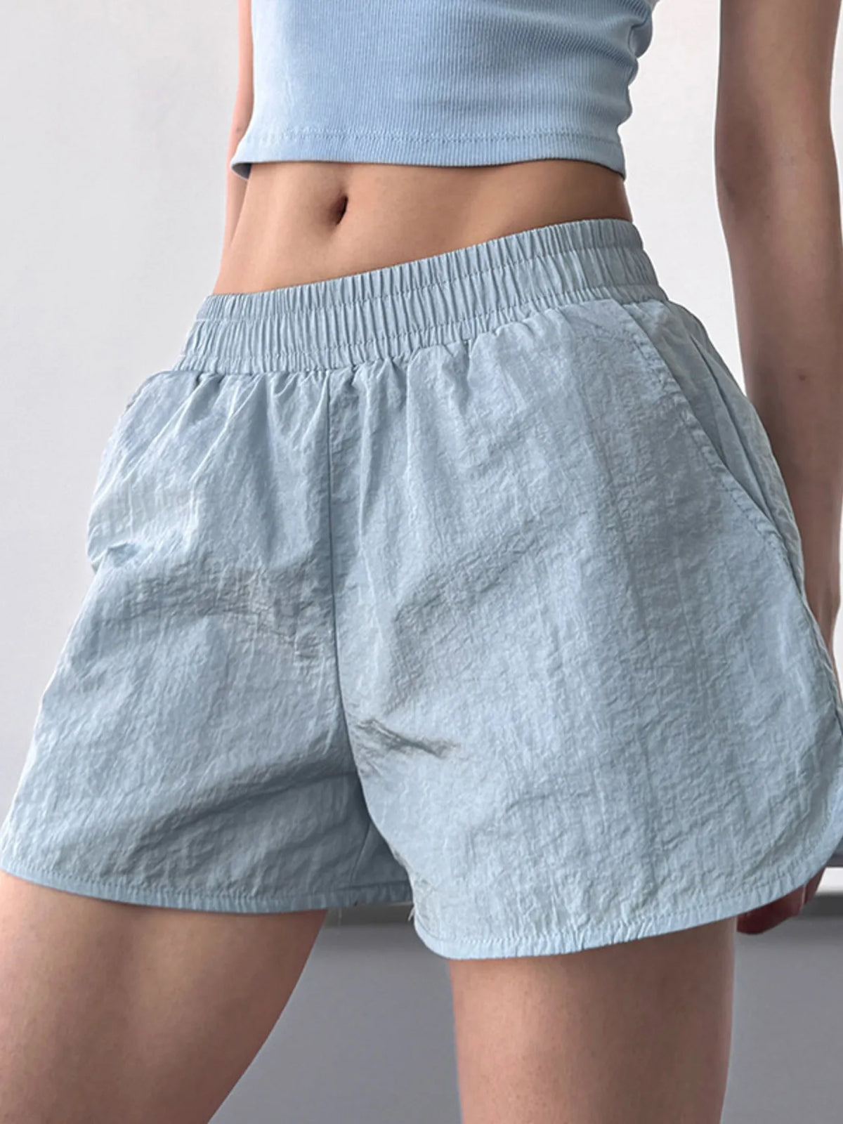 Quick dry elastic waist active shorts angled view